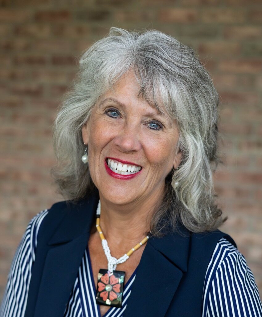 Empowered woman speaker at SpeakUp Conference promoting leadership and communication skills.